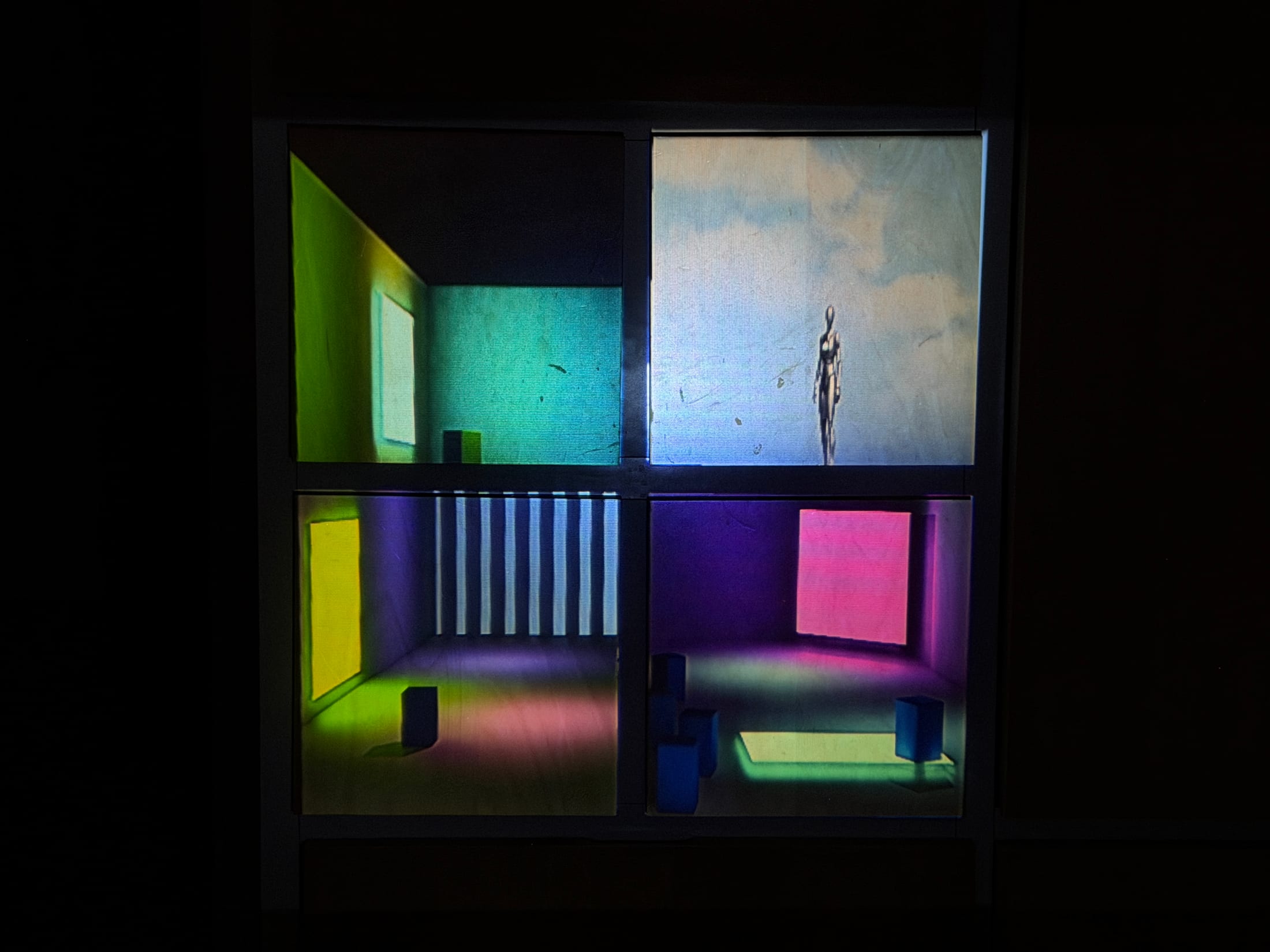 Miniature room facade illuminated with colourful mapped projection